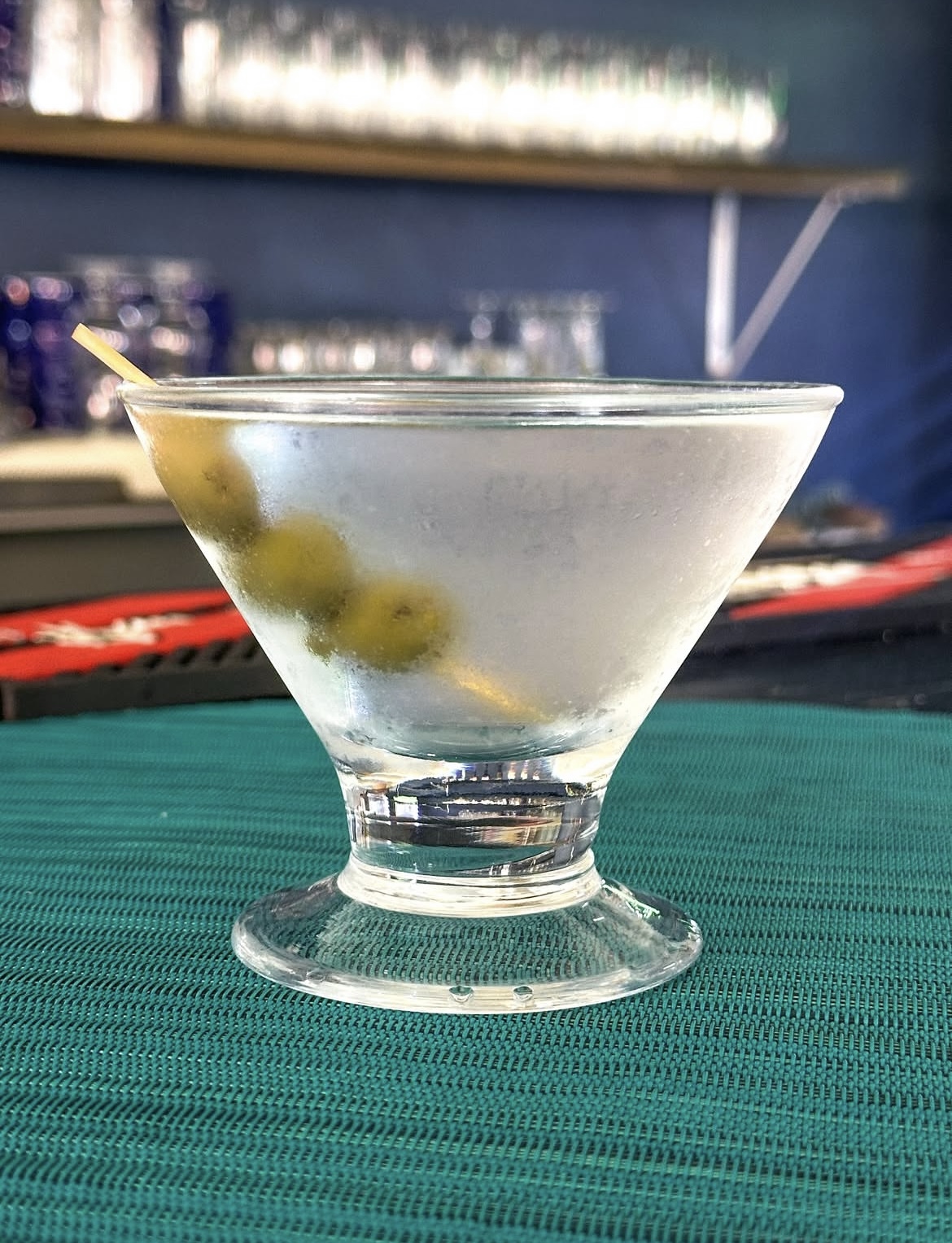 Classic martini with olives on the terrace