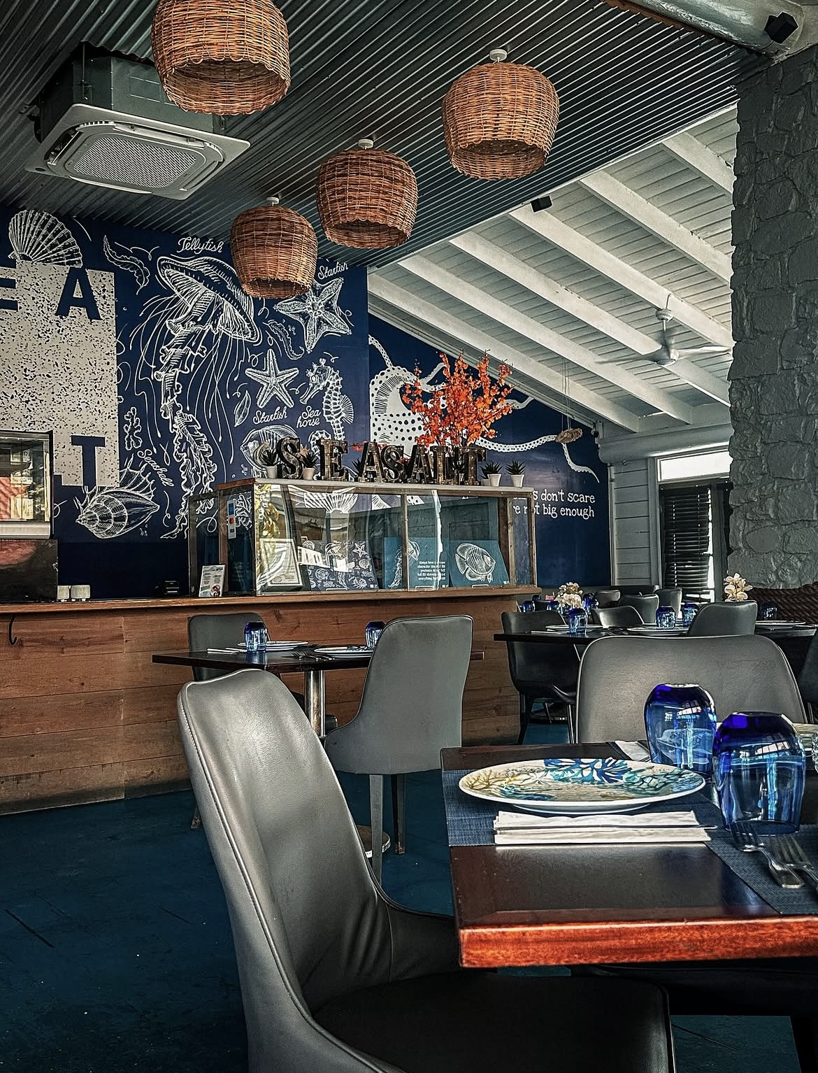 Sea Salt Restaurant dining room with hand-drawn sea life mural at Rodney Bay Marina