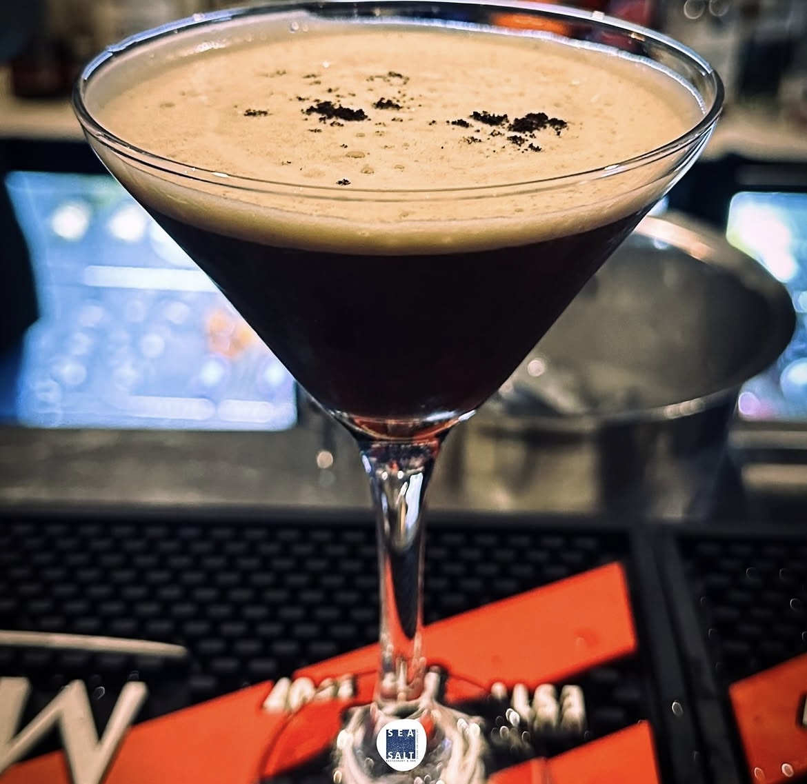 Espresso martini dusted with coffee grounds